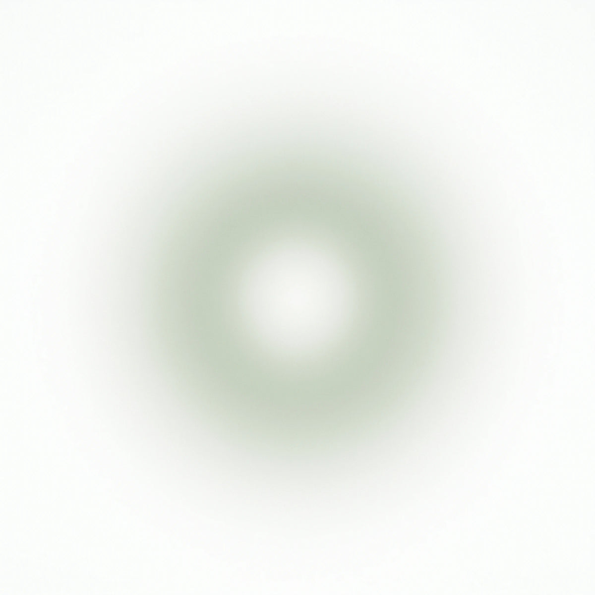 A soft, circular color swatch featuring a pale sage green gradient fading from a light green ring to a bright white center on a white background.